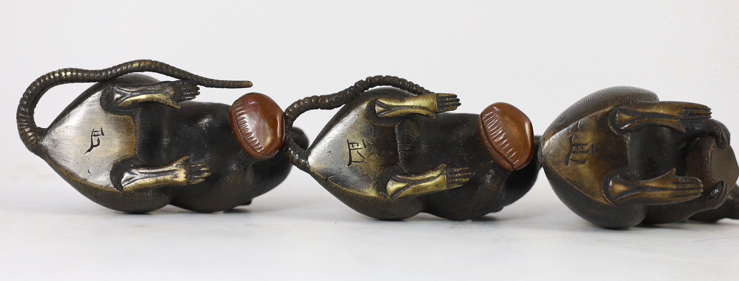 An assembled group of five Japanese bronze and mixed metal models of rats, Meiji period, smallest 9.5cm long, largest 16.5cm long, one small rat tail detached